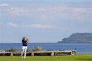 20 July 2025; Scottie Scheffler of USA watches his tee shot on the sixth hole during the final round of The 153rd Open Championship at Royal Portrush Golf Club in Portrush, Antrim. Photo by Ramsey Cardy/Sportsfile