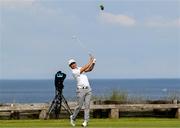 20 July 2025; Haotong Li of China plays his tee shot on the sixth hole during the final round of The 153rd Open Championship at Royal Portrush Golf Club in Portrush, Antrim. Photo by Ramsey Cardy/Sportsfile