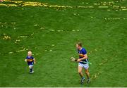 20 July 2025; Noel McGrath of Tipperary with his son Sam after his side's victory in during the GAA Hurling All-Ireland Senior Championship final match between Cork and Tipperary at Croke Park in Dublin. Photo by David Fitzgerald/Sportsfile