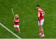 20 July 2025; Declan Dalton of Cork with his son DJ after his side's defeat in the GAA Hurling All-Ireland Senior Championship final match between Cork and Tipperary at Croke Park in Dublin. Photo by David Fitzgerald/Sportsfile