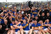 20 July 2025; Tipperary players and staff celebrate with the Liam MacCarthy Cup after their side's victory in the GAA Hurling All-Ireland Senior Championship final match between Cork and Tipperary at Croke Park in Dublin. Photo by Stephen McCarthy/Sportsfile