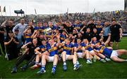 20 July 2025; Tipperary players and staff celebrate with the Liam MacCarthy Cup after their side's victory in the GAA Hurling All-Ireland Senior Championship final match between Cork and Tipperary at Croke Park in Dublin. Photo by Stephen McCarthy/Sportsfile