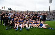 20 July 2025; Tipperary players and staff celebrate with the Liam MacCarthy Cup after their side's victory in the GAA Hurling All-Ireland Senior Championship final match between Cork and Tipperary at Croke Park in Dublin. Photo by Stephen McCarthy/Sportsfile