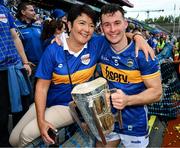 20 July 2025; Craig Morgan of Tipperary celebrates with his mother Bríd and the Liam MacCarthy Cup after his side's victory in the GAA Hurling All-Ireland Senior Championship final match between Cork and Tipperary at Croke Park in Dublin. Photo by Stephen McCarthy/Sportsfile