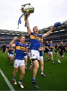 20 July 2025; John McGrath of Tipperary, centre, celebrates with the Liam MacCarthy cup alongside teammate Jason Forde after the GAA Hurling All-Ireland Senior Championship final match between Cork and Tipperary at Croke Park in Dublin. Photo by Seb Daly/Sportsfile