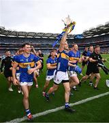 20 July 2025; John McGrath of Tipperary celebrates with the Liam MacCarthy cup and teammates after their side's victory in the GAA Hurling All-Ireland Senior Championship final match between Cork and Tipperary at Croke Park in Dublin. Photo by Seb Daly/Sportsfile