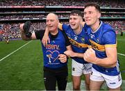 20 July 2025; Tipperary manager Liam Cahill, left, celebrates with Conor Stakelum, centre, and Craig Morgan after their side's victory in the GAA Hurling All-Ireland Senior Championship final match between Cork and Tipperary at Croke Park in Dublin. Photo by Seb Daly/Sportsfile