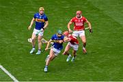 20 July 2025; Robert Doyle of Tipperary in action against Brian Hayes of Cork during the GAA Hurling All-Ireland Senior Championship final match between Cork and Tipperary at Croke Park in Dublin.