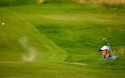 20 July 2025; Rory McIlroy of Northern Ireland plays out of a bunker on the 17th hole during the final round of The 153rd Open Championship at Royal Portrush Golf Club in Portrush, Antrim. Photo by Ramsey Cardy/Sportsfile
