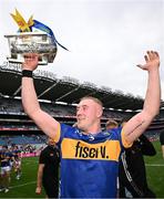 20 July 2025; Eoghan Connolly of Tipperary celebrates with the Liam MacCarthy cup after his side's victory in the GAA Hurling All-Ireland Senior Championship final match between Cork and Tipperary at Croke Park in Dublin. Photo by Seb Daly/Sportsfile