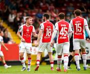 20 July 2025; Brandon Kavanagh of St Patrick's Athletic, left, celebrates after scoring his side's second goal with teammates during the Sports Direct Men’s FAI Cup second round match between St. Patrick’s Athletic and UCC at Richmond Park in Dublin. Photo by Michael P Ryan/Sportsfile