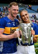 20 July 2025; Michael Breen of Tipperary celebrates with his girlfriend, Irish Olympian, Sharlene Mawdsley and the Liam MacCarthy Cup after his side's victory in the GAA Hurling All-Ireland Senior Championship final match between Cork and Tipperary at Croke Park in Dublin. Photo by Ray McManus/Sportsfile