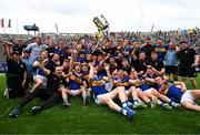 20 July 2025; Tipperary players and staff celebrate with the Liam MacCarthy cup after their side's victory in the GAA Hurling All-Ireland Senior Championship final match between Cork and Tipperary at Croke Park in Dublin. Photo by Stephen McCarthy/Sportsfile