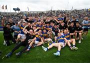 20 July 2025; Tipperary players and staff celebrate with the Liam MacCarthy cup after their side's victory in the GAA Hurling All-Ireland Senior Championship final match between Cork and Tipperary at Croke Park in Dublin. Photo by Stephen McCarthy/Sportsfile