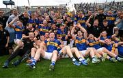 20 July 2025; Tipperary players and staff celebrate with the Liam MacCarthy cup after their side's victory in the GAA Hurling All-Ireland Senior Championship final match between Cork and Tipperary at Croke Park in Dublin. Photo by Stephen McCarthy/Sportsfile