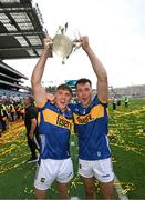20 July 2025; Johnny Ryan, left, and Craig Morgan of Tipperary celebrate with the Liam MacCarthy cup after their side's victory in the GAA Hurling All-Ireland Senior Championship final match between Cork and Tipperary at Croke Park in Dublin. Photo by Stephen McCarthy/Sportsfile
