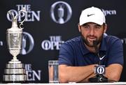20 July 2025; Scottie Scheffler of USA speaks in a press conference alongside the Claret Jug iafter winning The 153rd Open Championship at Royal Portrush Golf Club in Portrush, Antrim. Photo by Ramsey Cardy/Sportsfile