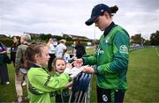 20 July 2025; Christina Coulter Reilly of Ireland signs autographs for supporters after match one of the Women's T20 International Series between Ireland and Zimbabwe at Pembroke Cricket Club in Dublin. Photo by Ben McShane/Sportsfile