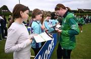20 July 2025; Sophie MacMahon of Ireland with supporters after match one of the Women's T20 International Series between Ireland and Zimbabwe at Pembroke Cricket Club in Dublin. Photo by Ben McShane/Sportsfile
