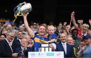 20 July 2025; Noel McGrath of Tipperary, and his son Sam, lift the Liam MacCarthy cup after victory in the GAA Hurling All-Ireland Senior Championship final match between Cork and Tipperary at Croke Park in Dublin. Photo by Stephen McCarthy/Sportsfile