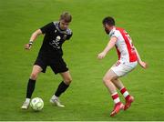 20 July 2025; Craig Walsh of UCC in action against Aidan Keena of St Patrick's Athletic during the Sports Direct Men’s FAI Cup second round match between St. Patrick’s Athletic and UCC at Richmond Park in Dublin. Photo by Michael P Ryan/Sportsfile
