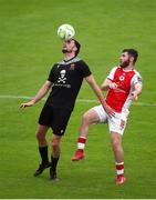 20 July 2025; Michael Fahy of UCC in action against Aidan Keena of St Patrick's Athletic during the Sports Direct Men’s FAI Cup second round match between St. Patrick’s Athletic and UCC at Richmond Park in Dublin. Photo by Michael P Ryan/Sportsfile