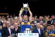20 July 2025; John McGrath of Tipperary lifts the Liam MacCarthy cup after the GAA Hurling All-Ireland Senior Championship final match between Cork and Tipperary at Croke Park in Dublin. Photo by Stephen McCarthy/Sportsfile