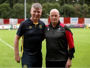 20 July 2025; St Patrick's Athletic manager Stephen Kenny, left, with UCC manager Noel Healy after the Sports Direct Men’s FAI Cup second round match between St. Patrick’s Athletic and UCC at Richmond Park in Dublin. Photo by Michael P Ryan/Sportsfile