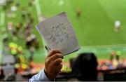 20 July 2025; Dave Punch of RTÉ holds up his notes after the GAA Hurling All-Ireland Senior Championship final match between Cork and Tipperary at Croke Park in Dublin. Photo by Daire Brennan/Sportsfile