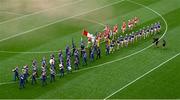 20 July 2025; The Tipperary and Cork teams parade behind the Artane School of Music Band ahead of the GAA Hurling All-Ireland Senior Championship final match between Cork and Tipperary at Croke Park in Dublin. Photo by Daire Brennan/Sportsfile