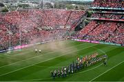 20 July 2025; The Tipperary and Cork teams parade behind the Artane School of Music Band ahead of the GAA Hurling All-Ireland Senior Championship final match between Cork and Tipperary at Croke Park in Dublin. Photo by Daire Brennan/Sportsfile