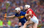 20 July 2025; Michael Breen of Tipperary is tackled by Patrick Horgan of Cork during the GAA Hurling All-Ireland Senior Championship final match between Cork and Tipperary at Croke Park in Dublin. Photo by Ray McManus/Sportsfile