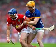 20 July 2025; Seán O'Donoghue of Cork is tackled by Jason Forde of Tipperary during the GAA Hurling All-Ireland Senior Championship final match between Cork and Tipperary at Croke Park in Dublin. Photo by Ray McManus/Sportsfile