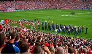 20 July 2025; The Tipperary and Cork teams follow the Artane Band in the pre game parade before the GAA Hurling All-Ireland Senior Championship final match between Cork and Tipperary at Croke Park in Dublin. Photo by Ray McManus/Sportsfile