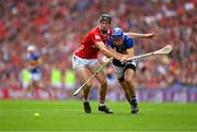 20 July 2025; John McGrath of Tipperary is tackled by Eoin Downey of Cork during the GAA Hurling All-Ireland Senior Championship final match between Cork and Tipperary at Croke Park in Dublin. Photo by Ray McManus/Sportsfile
