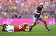 20 July 2025; Conor Stakelum of Tipperary in action against Declan Dalton of Cork during the GAA Hurling All-Ireland Senior Championship final match between Cork and Tipperary at Croke Park in Dublin. Photo by Piaras Ó Mídheach/Sportsfile