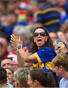 20 July 2025; A Tipperary supporter celebrates during the GAA Hurling All-Ireland Senior Championship final match between Cork and Tipperary at Croke Park in Dublin. Photo by Stephen McCarthy/Sportsfile