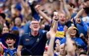 20 July 2025; Tipperary supporters celebrate a goal during the GAA Hurling All-Ireland Senior Championship final match between Cork and Tipperary at Croke Park in Dublin. Photo by Stephen McCarthy/Sportsfile