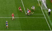 20 July 2025; John McGrath of Tipperary is fouled by Eoin Downey of Cork, resulting in a penalty for Tipperary and a red card for Eoin Downey, during the GAA Hurling All-Ireland Senior Championship final match between Cork and Tipperary at Croke Park in Dublin. Photo by Seb Daly/Sportsfile
