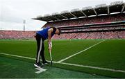 20 July 2025; Tipperary manager Liam Cahill fixes a sideline flag during the GAA Hurling All-Ireland Senior Championship final match between Cork and Tipperary at Croke Park in Dublin. Photo by Seb Daly/Sportsfile