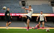 21 July 2025; Fin Smith is watched by assistant coach Jonathan Sexton, left, and Owen Farrell during a British & Irish Lions captain's run at Marvel Stadium in Melbourne, Australia. Photo by Brendan Moran/Sportsfile