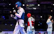 21 July 2025; Ryan Doyle, from Balleycullen in Dublin, representing Technological University Dublin and Ireland, in action against Armen Danielyan, representing Armenian State Institute of Physical Culture and Armenia, during the men's 74kg match on day five of the FISU World University Games 2025 at Messe Essen Halle in Essen, Germany. Photo by Shauna Clinton/Sportsfile