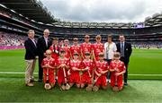 20 July 2025; Camogie Association president Brian Molloy, Uachtarán Chumann Lúthchleas Gael Jarlath Burns, INTO President Anne Horan, and President of Cumann na mBunscol Gary Farrell, with the Cork team, back row, left to right, Ben Lynch, St Brendan's NS, Portumna, Galway, Páidí Tierney, Church Hill NS, Cuffesgrange, Kilkenny, Józef Hangonyi, St Joseph's NS, Borris-in-Ossory, Laois, Bruno Grzybowski, Scoil Naomi Erc, Glenderry, Kerry, Eliah Kenny, Clonmoney NS, Newmarket-on-Fergus, Clare, front row, left to right, Ben O'Riordan, Aghabullogue NS, Aghabullogue, Cork, Bryan O'Shaughnessy, St Anthony's BNS, Ballinlough, Cork, Craig Glavey, Aghamore NS, Ballyhaunis, Mayo, Howard Madden, St Brendan's NS, Portumna, Galway, Jack Morrison, Scoil Mhuire Gan Smál, Fermoy, Cork, and Oisín Coughlan, Naomh Eoin NS, Birr, Offaly, before the GAA INTO Cumann na mBunscol Respect Exhibition Go Games at the GAA Hurling All-Ireland Senior Championship final match between Cork and Tipperary at Croke Park in Dublin. Photo by Daire Brennan/Sportsfile