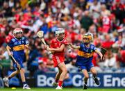 20 July 2025; Darragh O'Callaghan, St Joseph's PS, Bessbrook, Armagh, representing Tipperary and Ben Lynch, St Brendan's NS, Portumna, Galway, representing Cork in action against Rossa McAleenan, Bunscoil Bheanna Boirche, Castlewellan, Down, representing Tipperary during the GAA INTO Cumann na mBunscol Respect Exhibition Go Games at the GAA Hurling All-Ireland Senior Championship final match between Cork and Tipperary at Croke Park in Dublin. Photo by Ray McManus/Sportsfile