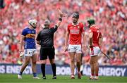 20 July 2025; Robert Downey of Cork is shown a yellow card by referee Liam Gordon during the GAA Hurling All-Ireland Senior Championship final match between Cork and Tipperary at Croke Park in Dublin. Photo by Seb Daly/Sportsfile