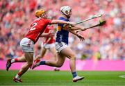 20 July 2025; Darragh McCarthy of Tipperary in action against Niall O'Leary of Cork during the GAA Hurling All-Ireland Senior Championship final match between Cork and Tipperary at Croke Park in Dublin. Photo by Seb Daly/Sportsfile