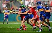20 July 2025; James Donnelly, St Mary's NS, Stranorlar, Donegal, representing Tipperary, in action against Ben O'Riordan, Aghabullogue NS, Aghabullogue, Cork, representing Cork, right, during the GAA INTO Cumann na mBunscol Respect Exhibition Go Games at the GAA Hurling All-Ireland Senior Championship final match between Cork and Tipperary at Croke Park in Dublin. Photo by Seb Daly/Sportsfile