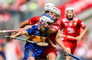 20 July 2025; Hugo O'Neill, Scoil Chéile Chríost NS, Rathmore, Kildare, representing Tipperary, in action against Jack Morrison, Scoil Mhuire Gan Smál, Fermoy, Cork, representing Cork, during the GAA INTO Cumann na mBunscol Respect Exhibition Go Games at the GAA Hurling All-Ireland Senior Championship final match between Cork and Tipperary at Croke Park in Dublin. Photo by Seb Daly/Sportsfile
