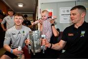 21 July 2025; Captain of All-Ireland Hurling Champions Tipperary, Ronan Maher, right, and teammate Jake Morris, left, with Iseult Shelly, aged 10 months from Blackrock, Dublin, and her mother Martha McGann and the Liam MacCarthy Cup at Children's Health Ireland, Crumlin in Dublin after winning The Liam MacCarthy Cup at Croke Park on Sunday. Photo by Sam Barnes/Sportsfile