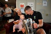 21 July 2025; Captain of All-Ireland Hurling Champions Tipperary, Ronan Maher, right, with Iseult Shelly, aged 10 months from Blackrock, Dublin, and her mother Martha McGann and the Liam MacCarthy Cup at Children's Health Ireland, Crumlin in Dublin after winning The Liam MacCarthy Cup at Croke Park on Sunday. Photo by Sam Barnes/Sportsfile